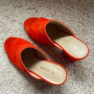 M. GEMI suede open toe, block heel mules in fantastic red orange.